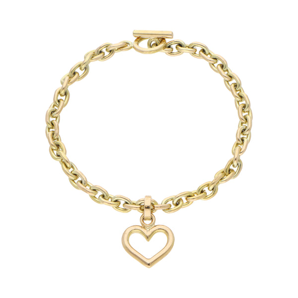 Pulsera eslabón cruzado con dije motivo corazón en oro amarillo 14 kilates.