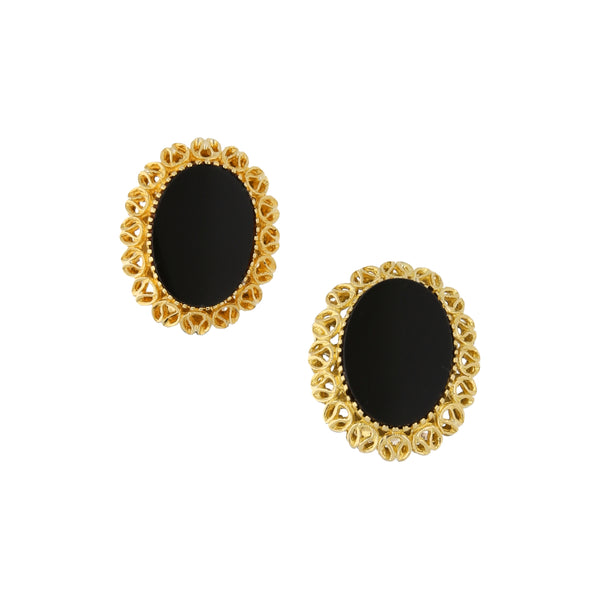 Aretes estilizados calados con ónix en oro amarillo 18 kilates.