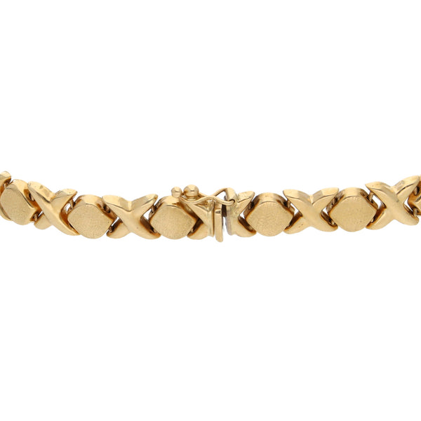 Pulsera eslabón XOXO en oro amarillo 14 kilates.