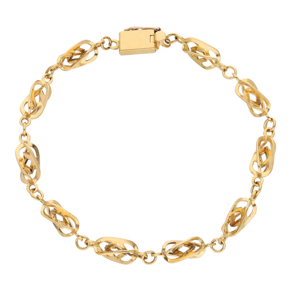 Pulsera eslabón combinado en oro amarillo 18 kilates.