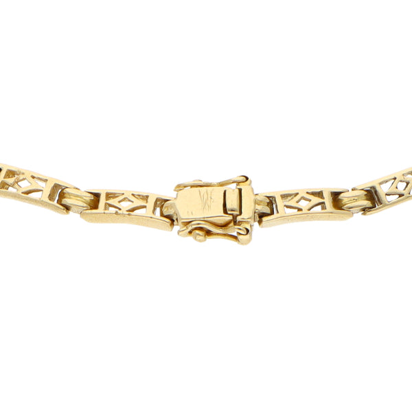 Pulsera eslabón combinado con sintéticos en oro amarillo 18 kilates.