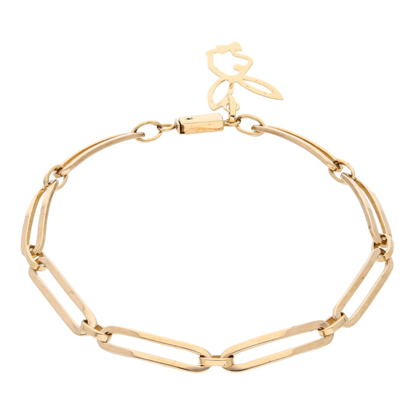 Pulsera eslabón cruzado combinado con colgante motivo conejo en oro amarillo 14 kilates.