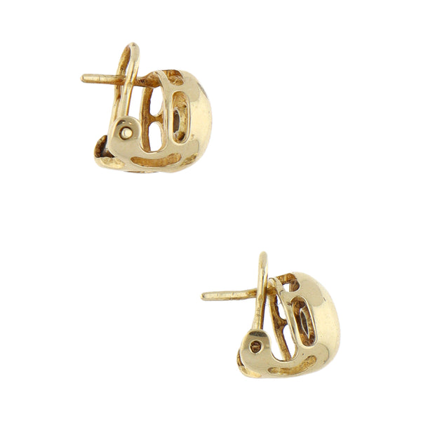 Aretes diseño especial con circonias en oro amarillo 14 kilates.