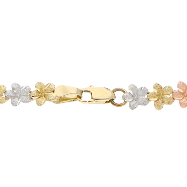 Pulsera eslabón articulado motivo floral en oro tres tonos 14 kilates.