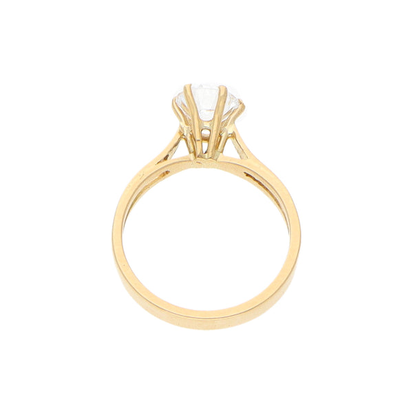 Anillo solitario con circonia en oro amarillo 18 kilates.