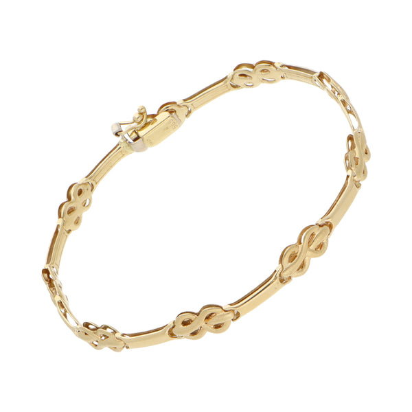 Pulsera eslabón combinado en oro amarillo 14 kilates.