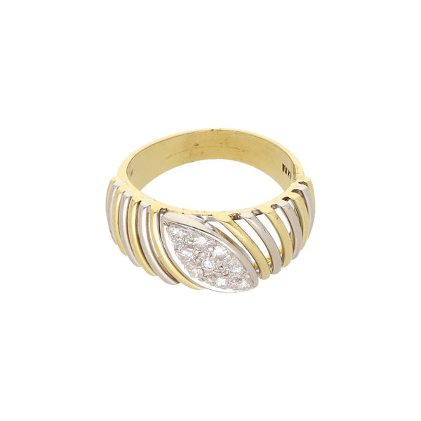 Anillo calado con diamates en oro dos tonos 18 kilates.