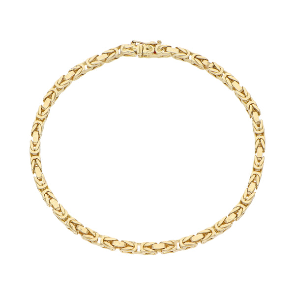 Pulsera eslabón cruzado doble en oro amarillo 14 kilates.