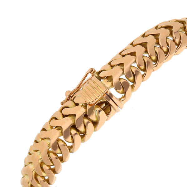 Pulsera eslabón palmeado en oro amarillo 18 kilates.