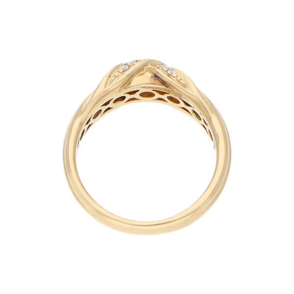 Anillo acanalado con diamantes en oro amarillo 14 kilates.