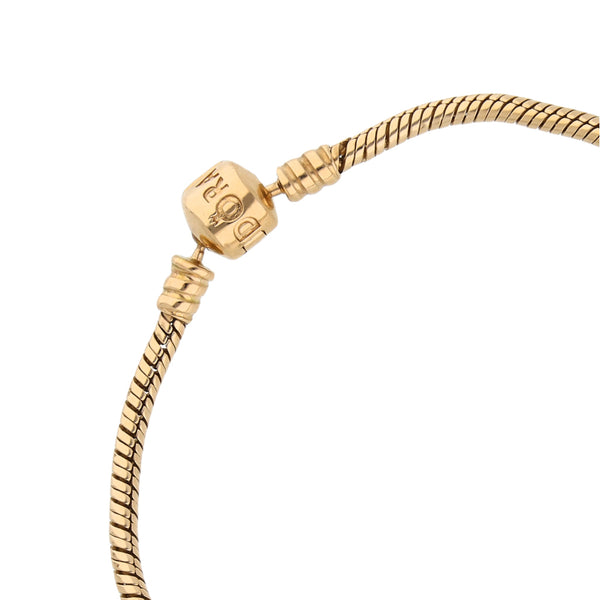 Pulsera eslabón cola de ratón con aplicaciones en oro amarillo 14 kilates.