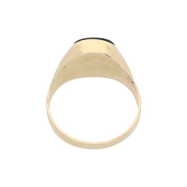 Anillo tipo sello con ónix en oro amarillo 14 kilates.