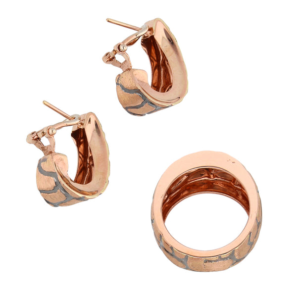 Juego de anillo y aretes diseño especial con esmalte en oro rosa 14 kilates.