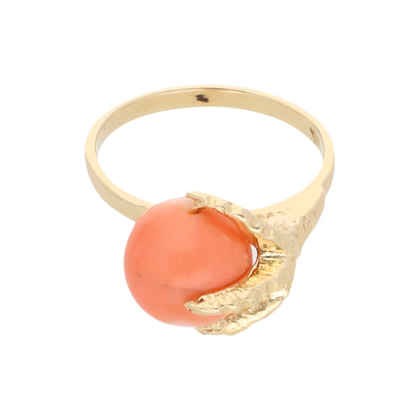 Anillo diseño especial con coral motivo garra en oro amarillo 14 kilates.