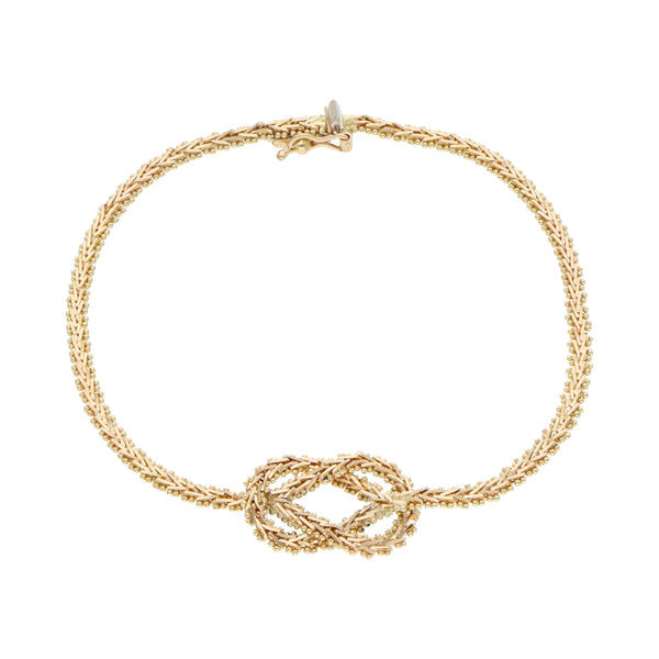 Pulsera eslabón boleado con aplicación en oro amarillo 14 kilates.