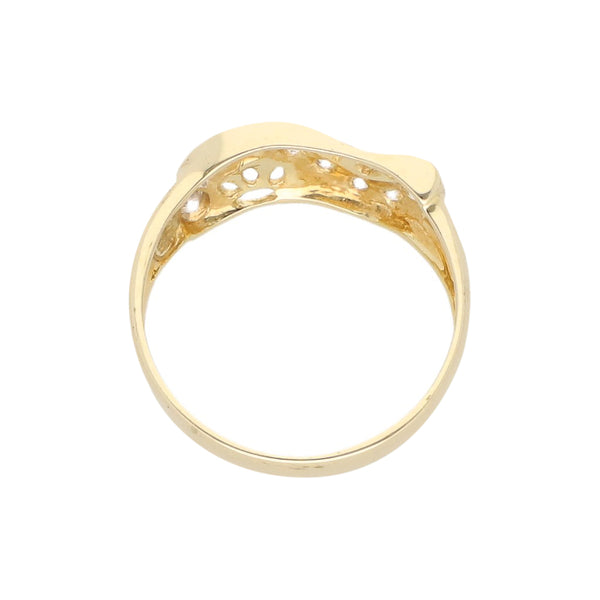 Anillo calado con circonias en oro amarillo 14 kilates.