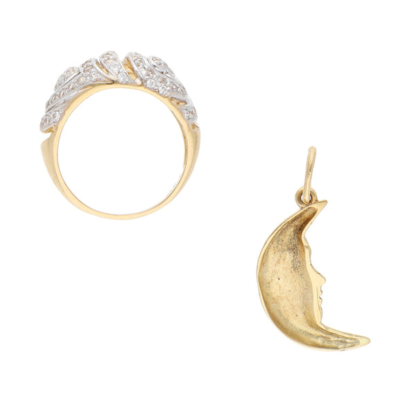 Anillo estilizado con circonias y dije diseño especial motivo luna en oro amarillo 14 kilates.