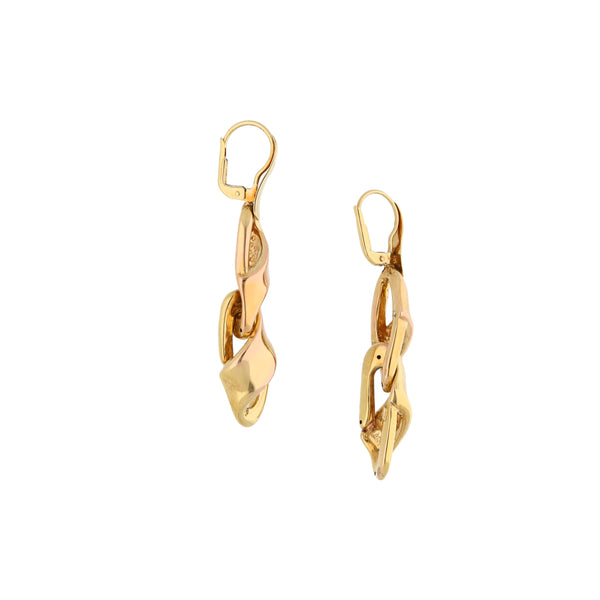 Aretes articulados en oro amarillo 14 kilates.
