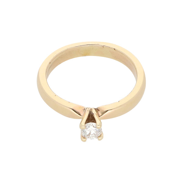 Anillo solitario con diamante en oro amarillo 14 kilates.