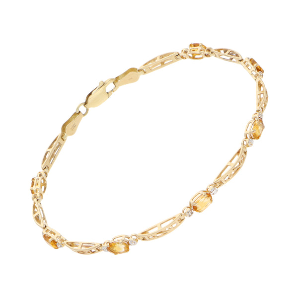 Pulsera eslabón combinado con citrinos en oro amarillo 14 kilates.