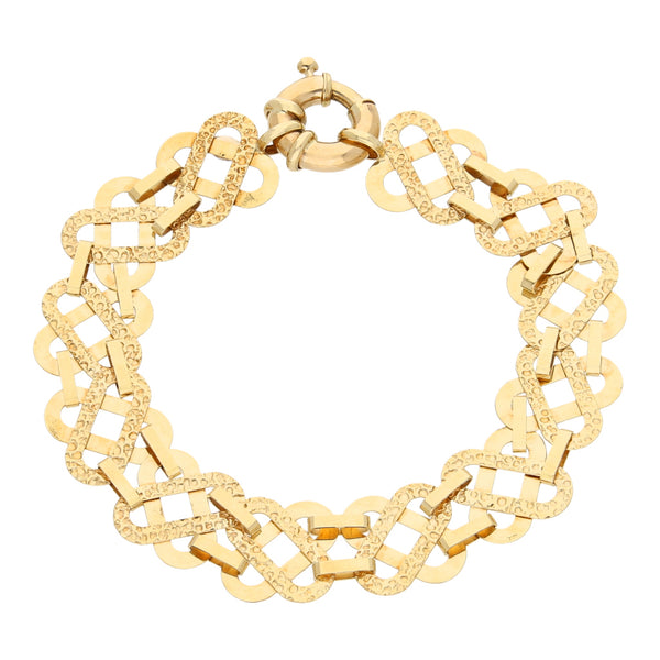 Pulsera eslabón combinado laminado en oro amarillo 14 kilates.