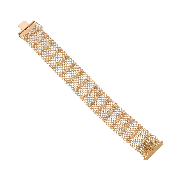 Pulsera eslabón tejido con aplicaciones en oro amarillo 18 kilates.