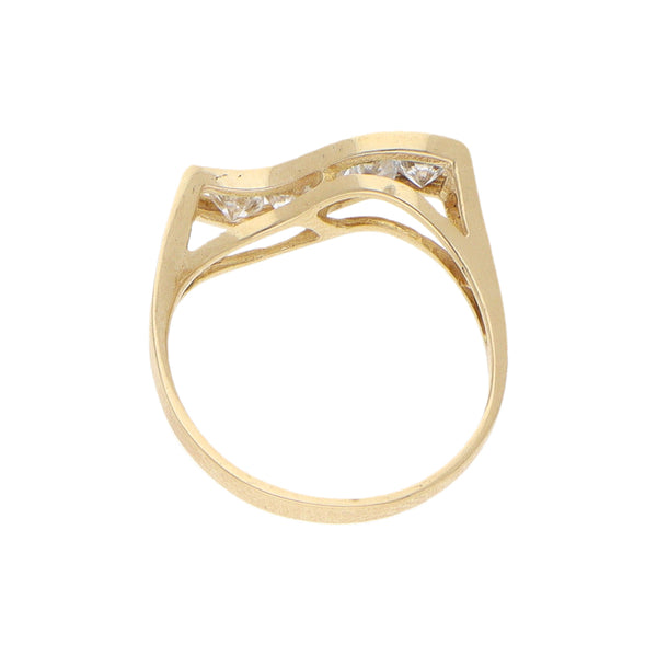 Anillo ondulado con sintéticos en oro amarillo 14 kilates.