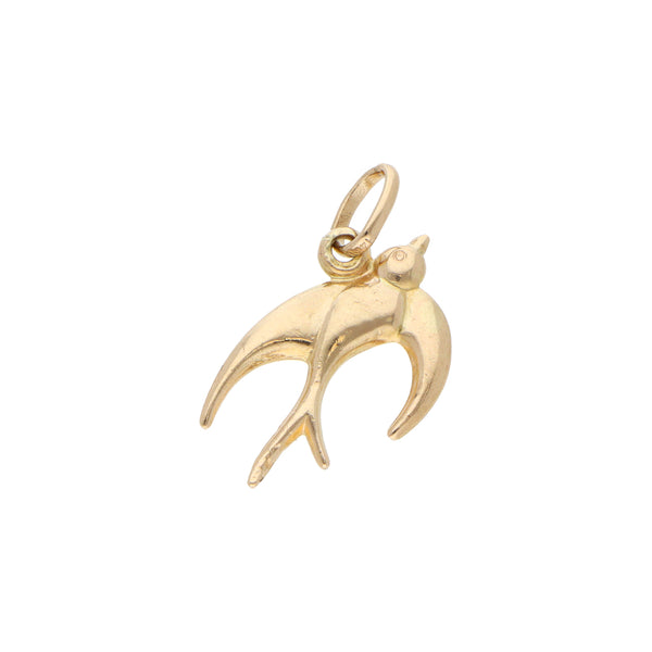 Dije diseño especial motivo golondrina en oro amarillo 14 kilates.