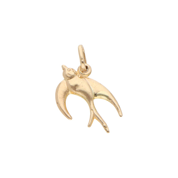 Dije diseño especial motivo golondrina en oro amarillo 14 kilates.