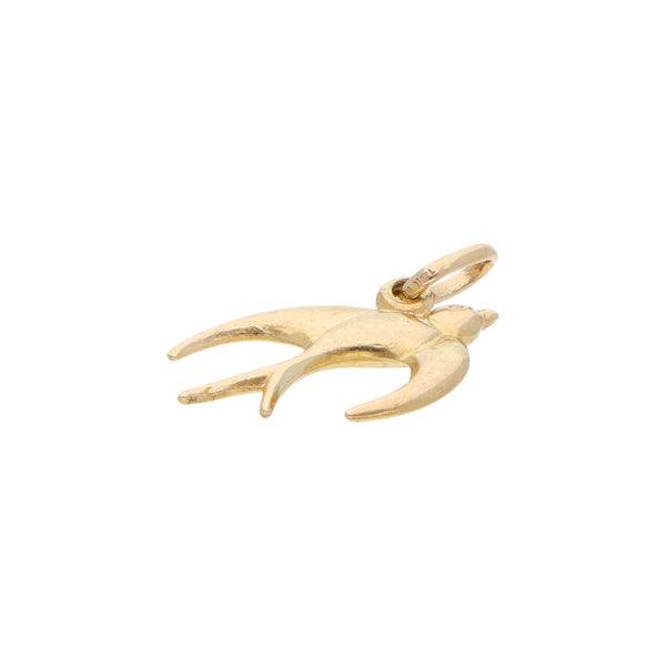 Dije diseño especial motivo golondrina en oro amarillo 14 kilates.