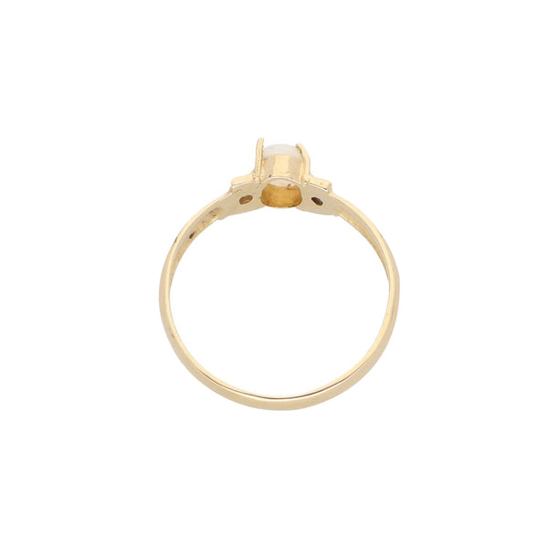 Anillo diseño especial con ópalo y circonias en oro amarillo 14 kilates.