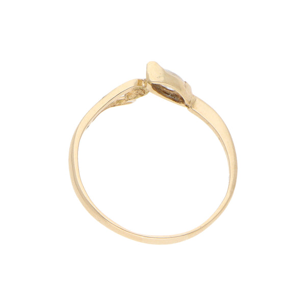 Anillo calado motivo corazón con circonia en oro amarillo 14 kilates.