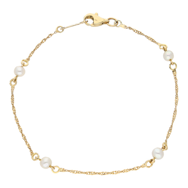 Pulsera eslabón combinado con perlas en oro amarillo 14 kilates.