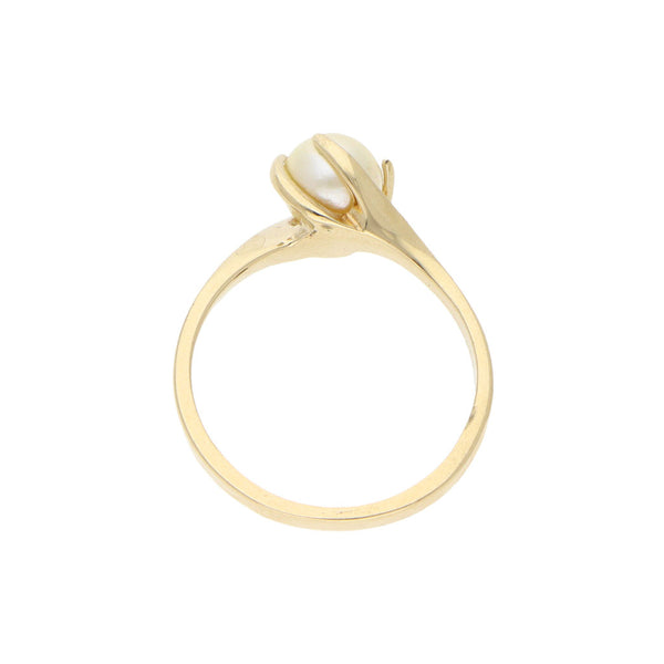 Anillo diseño especial con perla en oro amarillo 14 kilates.