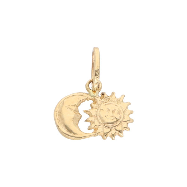 Dije diseño especial motivo sol y luna en oro amarillo 14 kilates.