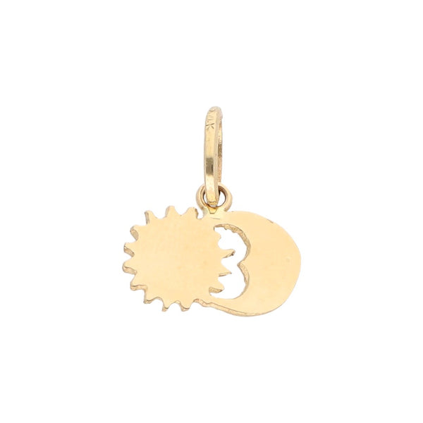 Dije diseño especial motivo sol y luna en oro amarillo 14 kilates.