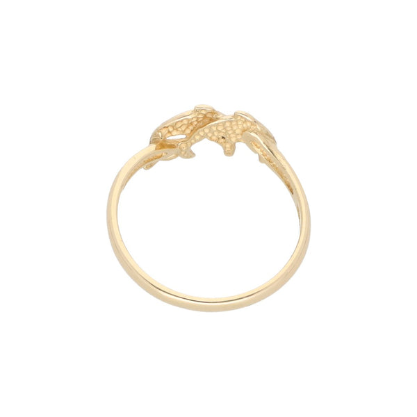 Anillo estilizado motivo delfines con circonias en oro amarillo 14 kilates.