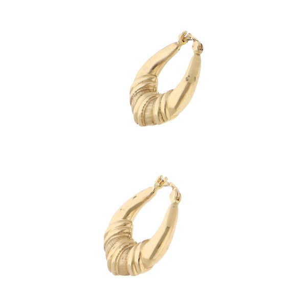 Arracadas huecas en oro amarillo 14 kilates.