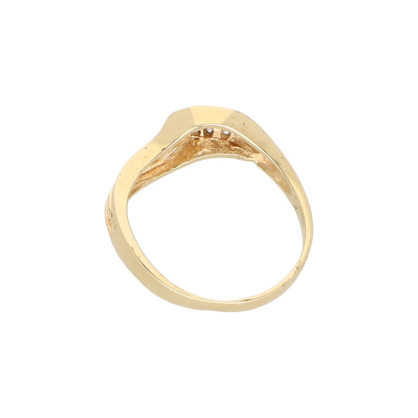 Anillo calado con circonias en oro amarillo 14 kilates.