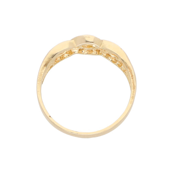 Anillo calado con circonias en oro amarillo 14 kilates.