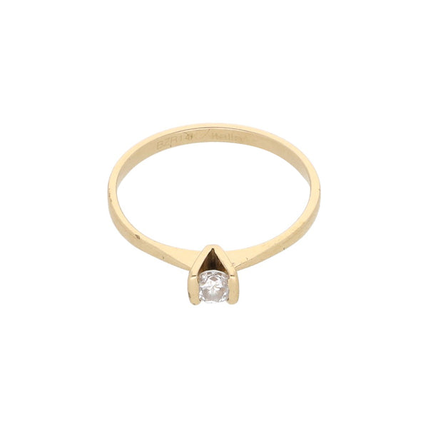 Anillo solitario con diamante en oro amarillo 14 kilates.