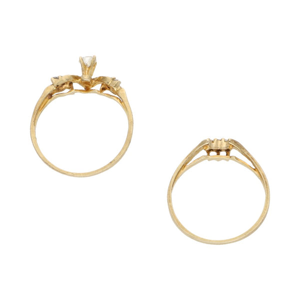 Dos anillos diseño especial con circonias en oro amarillo 14 kilates.