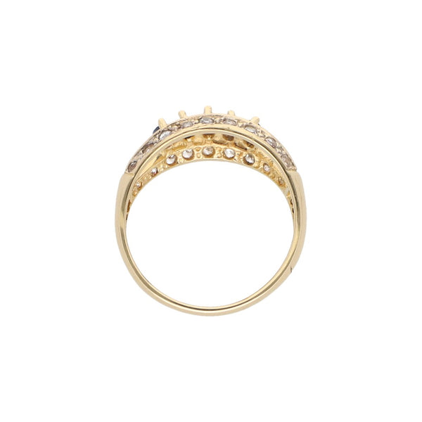 Anillo estilizado con zafiros y circonias en oro amarillo 14 kilates.