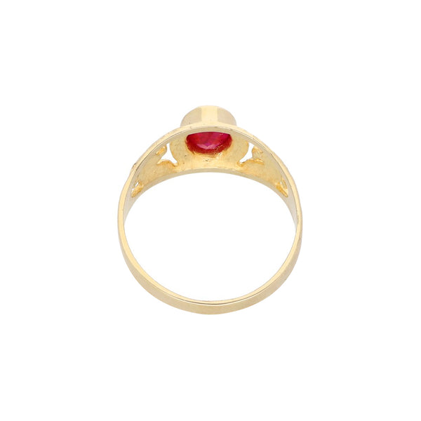 Anillo calado motivo águilas con sintético en oro amarillo 14 kilates.