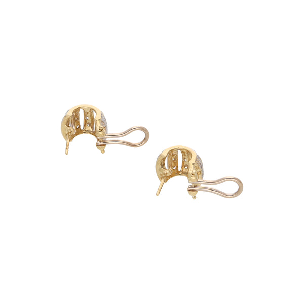 Aretes calados con circonias en oro amarillo 14 kilates.