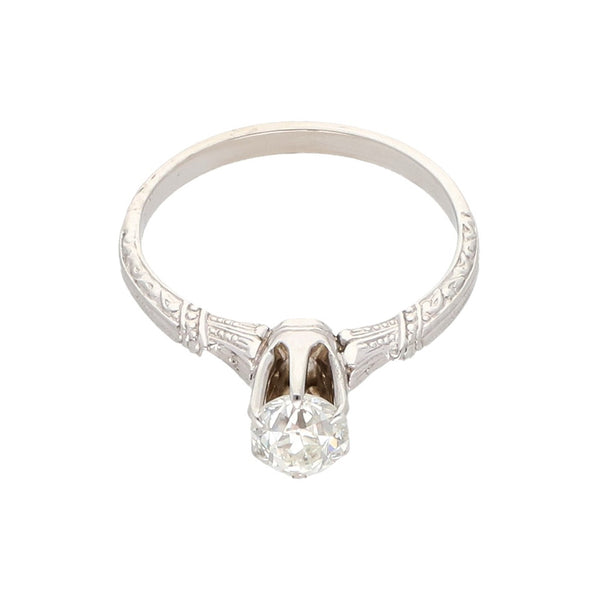 Anillo solitario con diamante en oro blanco 14 kilates.