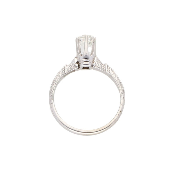 Anillo solitario con diamante en oro blanco 14 kilates.