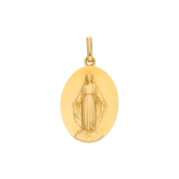 Medalla troquelada motivo Virgen en oro amarillo 18 kilates.