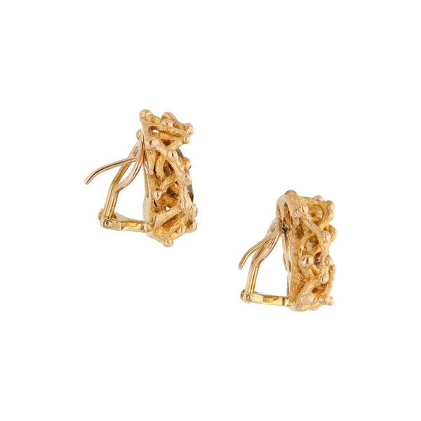 Aretes barrocos con cuarzos en oro amarillo 14 kilates.