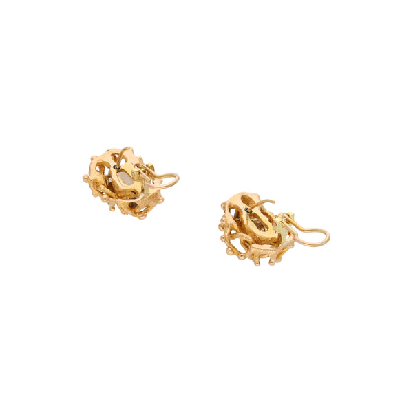 Aretes barrocos con cuarzos en oro amarillo 14 kilates.